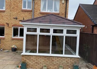 Tiled conservatory roof conversion on a gable-end conservatory by F J Allan & Sons